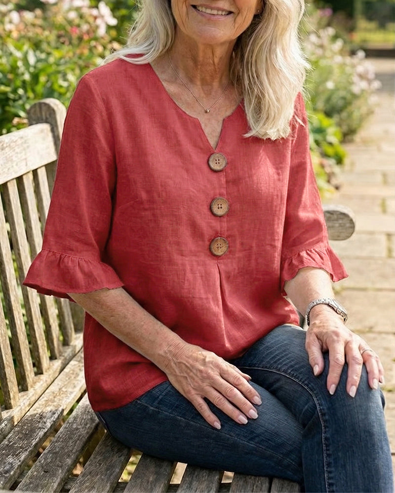 Blusa Sophia de algodón-lino con botones de madera y volantes