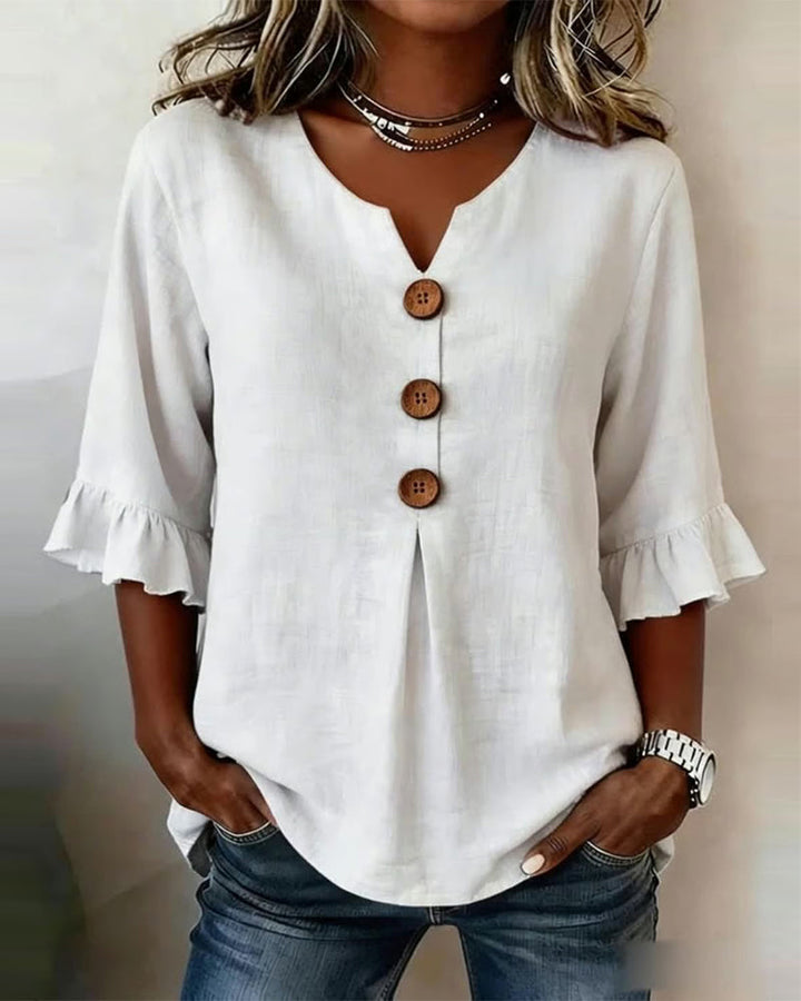 Blusa Sophia de algodón-lino con botones de madera y volantes