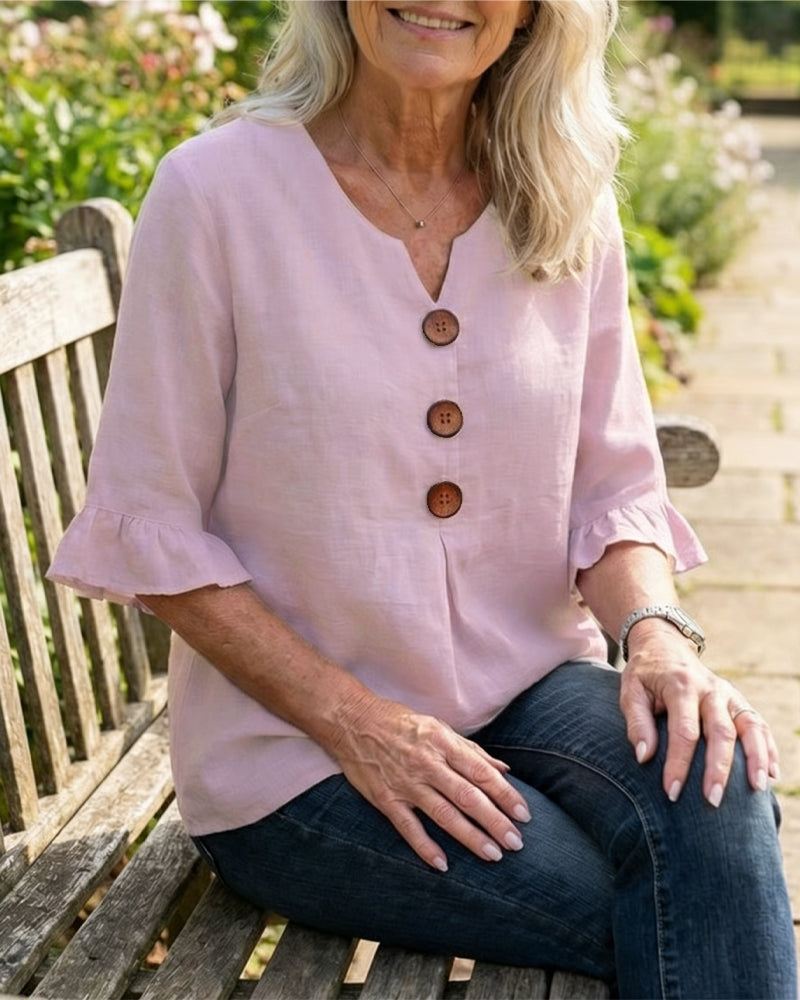 Blusa Sophia de algodón-lino con botones de madera y volantes