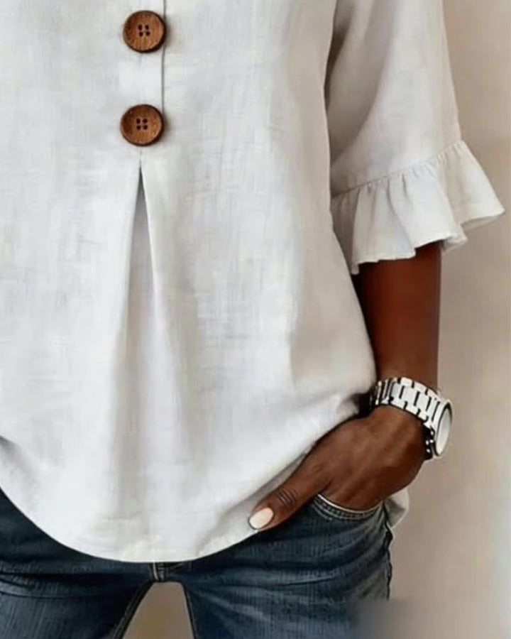 Blusa Sophia de algodón-lino con botones de madera y volantes