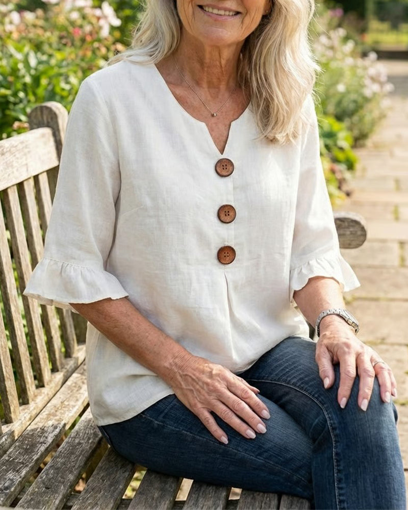 Blusa Sophia de algodón-lino con botones de madera y volantes