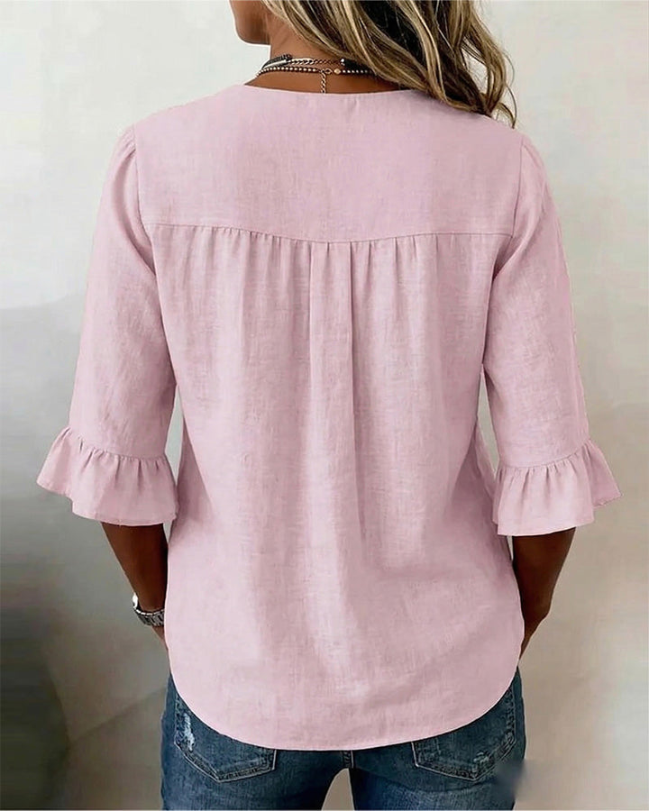 Blusa Sophia de algodón-lino con botones de madera y volantes
