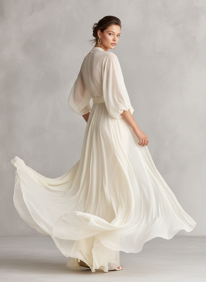 VESTIDO MAXI DE GASA MARFIL CON MANGAS ABULLONADAS Y ESCOTE CRUZADO