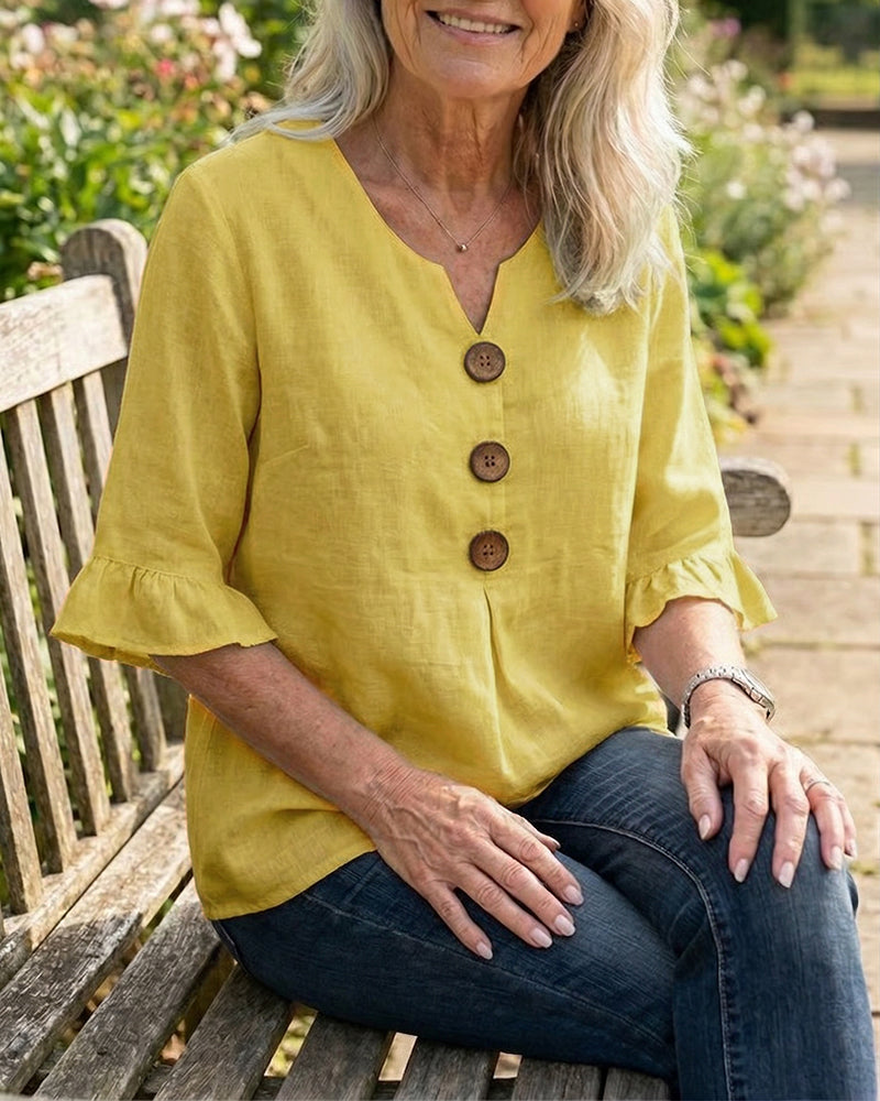 Blusa Sophia de algodón-lino con botones de madera y volantes