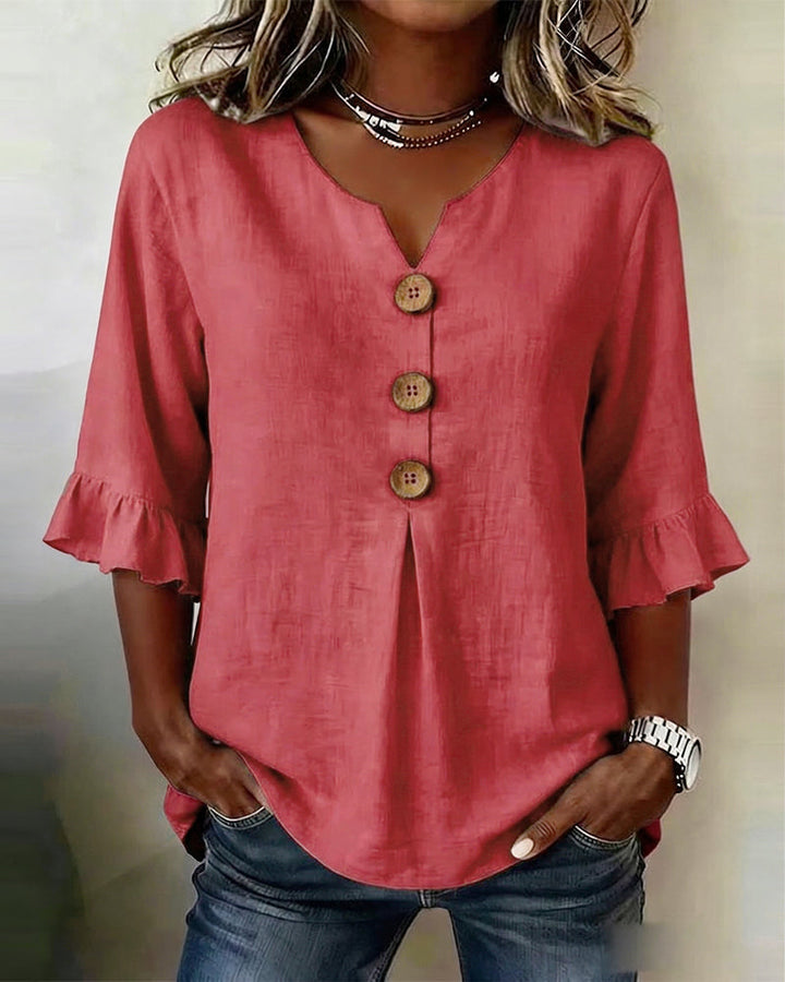 Blusa Sophia de algodón-lino con botones de madera y volantes