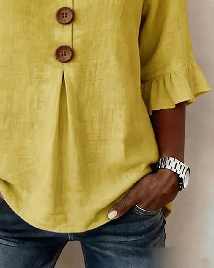 Blusa Sophia de algodón-lino con botones de madera y volantes